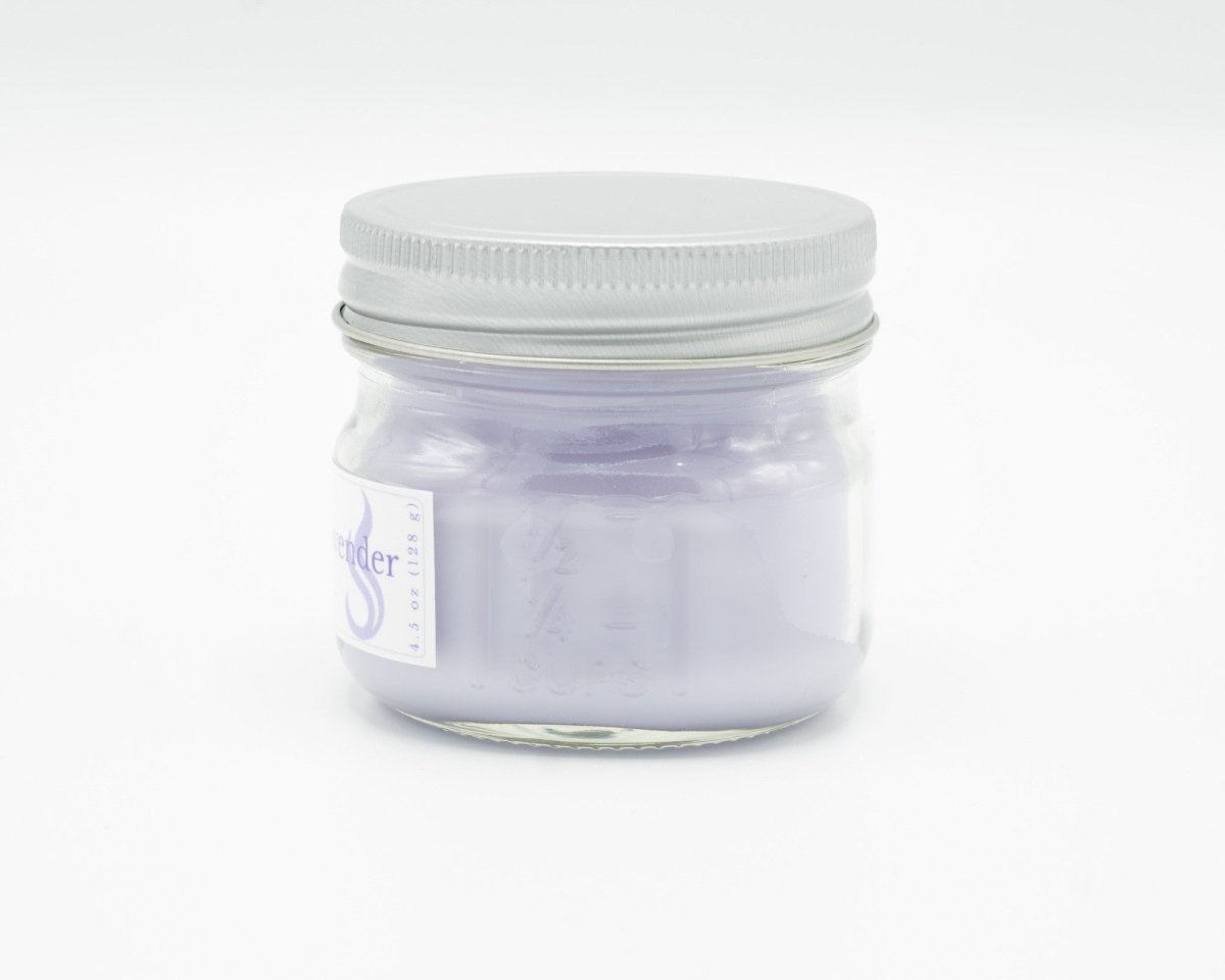 Gentle Sage & Lavender Coconut Apricot Candle in a 4.5oz mason jar. Side view.
