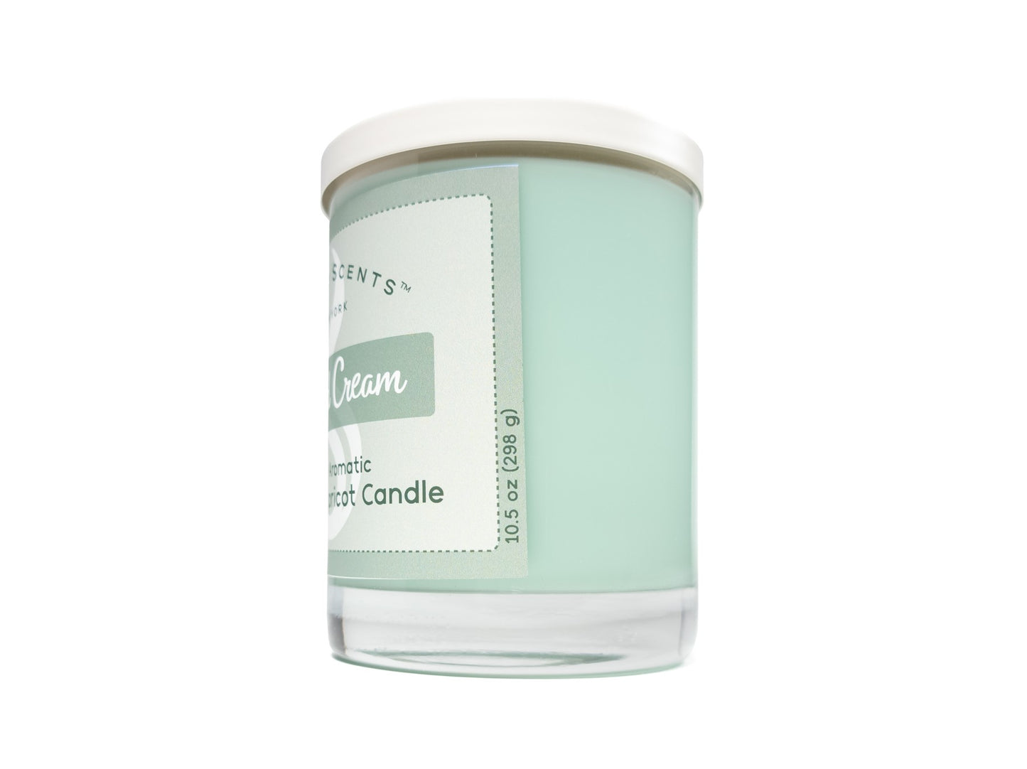 10.5oz Spiced Cream Softly Aromatic Coconut Apricot Candle by Slight Scents, handcrafted in New York. Side photo on a white background with a white lid.