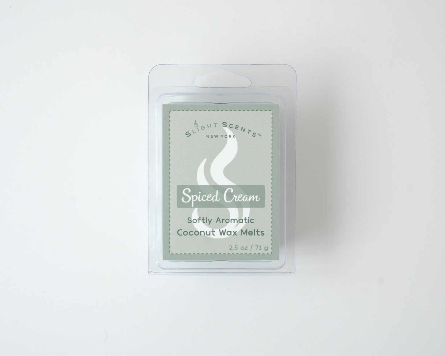 Spiced Cream wax melt on a white background. Closed clam shell container.