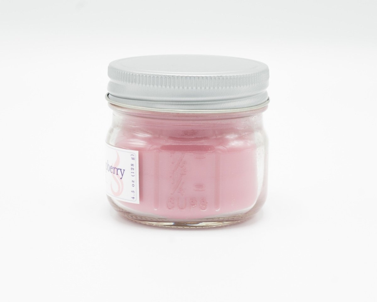 Sweet Black Raspberry Coconut Apricot Candle in a 4.5oz mason jar. Side view.