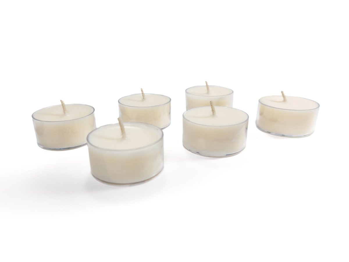 6 pack Unscented 100% Soy Tealight Candles by Slight Scents, handcrafted in New York. 3.42oz / 97g. Loose tealights sitting on a white background.