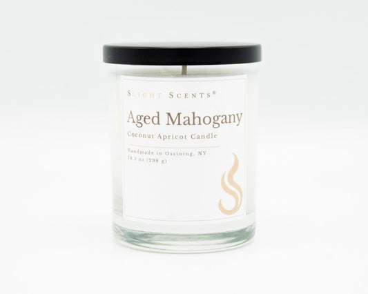 Aged Mahogany Softly Aromatic Coconut Apricot Candle by Slight Scents New York against a white background.