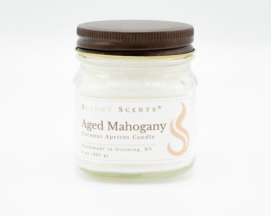 Aged Mahogany Coconut Apricot Candle in a 8oz mason jar. Front view.