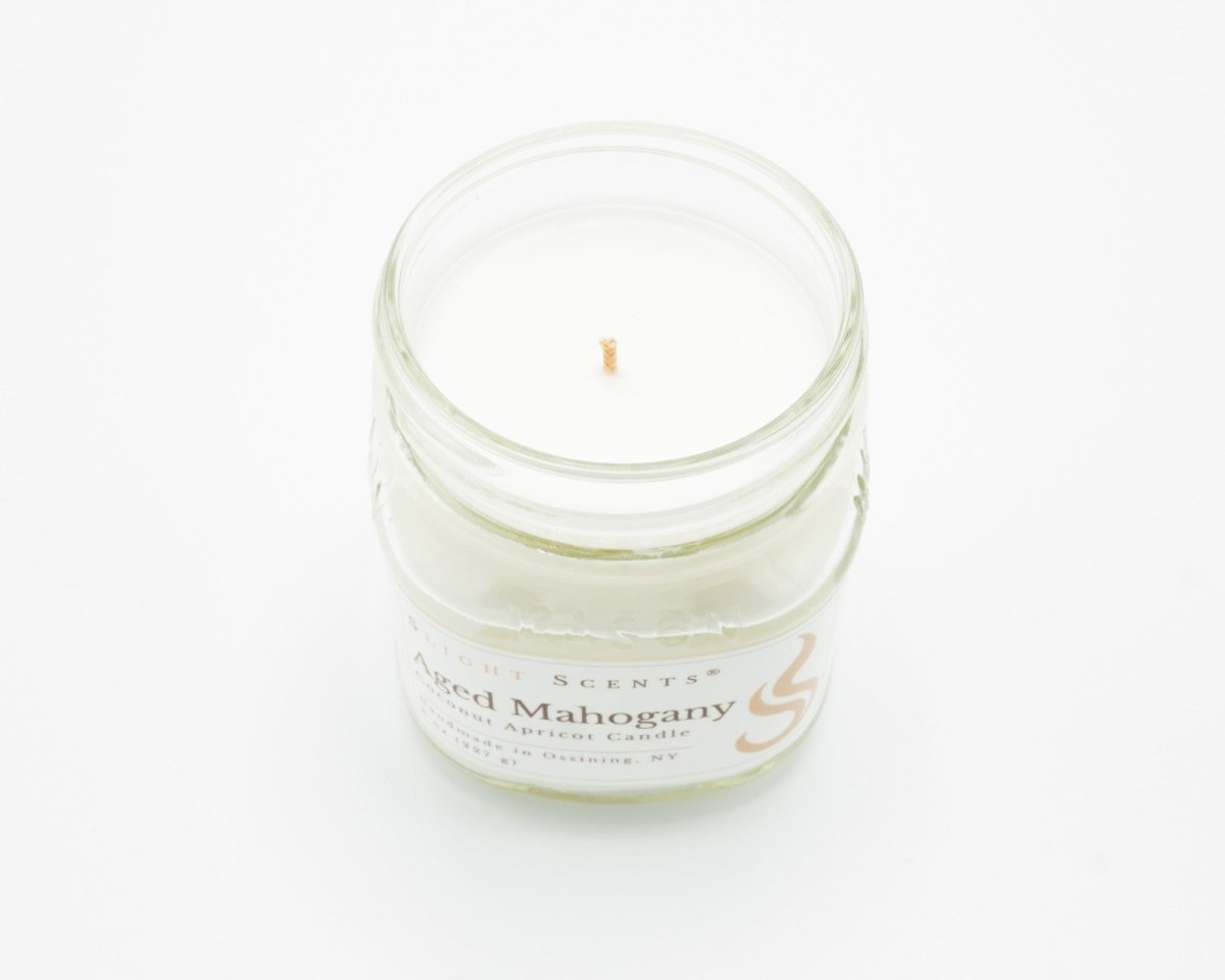 Aged Mahogany Coconut Apricot Candle in a 8oz mason jar, no lid.