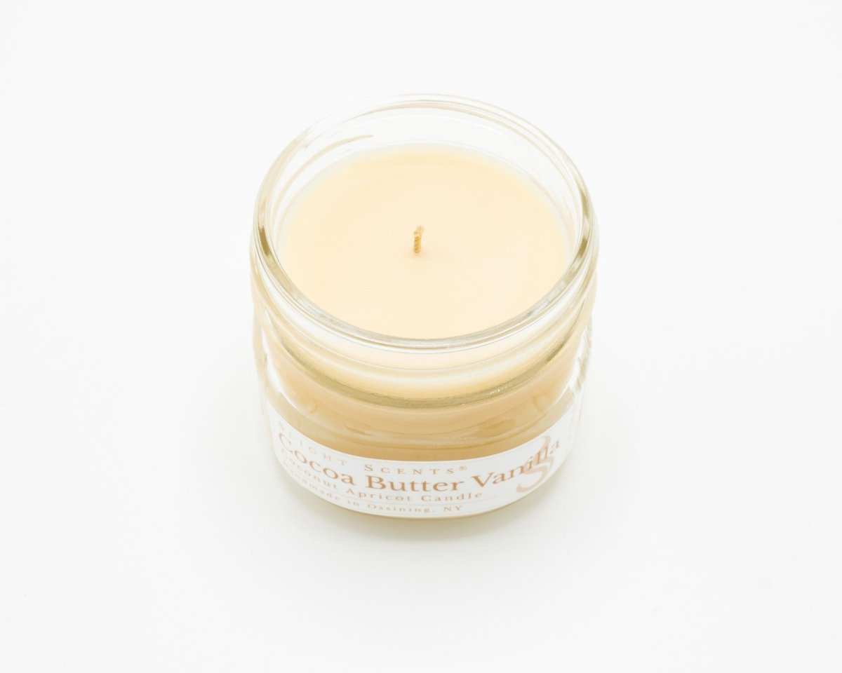 Cocoa Butter Vanilla Coconut Apricot Candle in a 4.5oz mason jar without a lid.