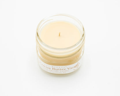 Cocoa Butter Vanilla Coconut Apricot Candle in a 4.5oz mason jar without a lid.
