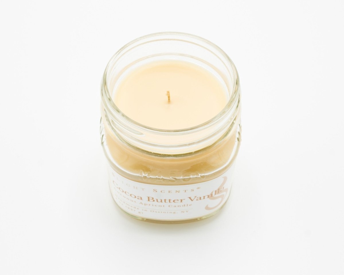 Cocoa Butter Vanilla Coconut Apricot Candle in a 8oz mason jar without a lid.
