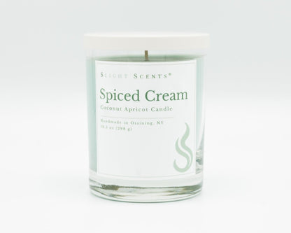 Spiced Cream Softly Aromatic Coconut Apricot Candle by Slight Scents New York against a white background.