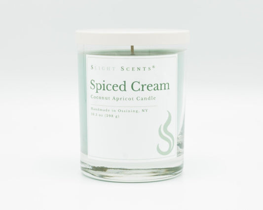 Spiced Cream Softly Aromatic Coconut Apricot Candle by Slight Scents New York against a white background.