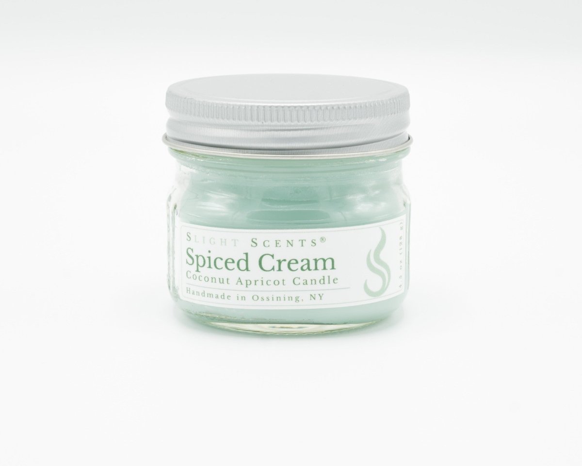 Spiced Cream Coconut Apricot Candle in a 4.5oz mason jar. Front view. 