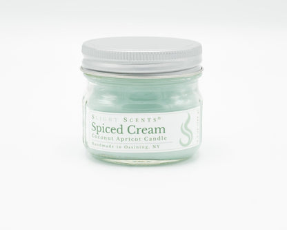Spiced Cream Coconut Apricot Candle in a 4.5oz mason jar. Front view. 
