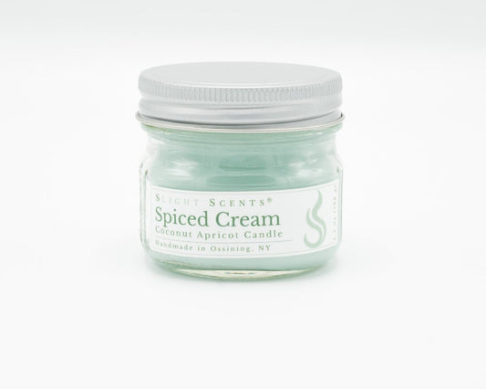 Spiced Cream Coconut Apricot Candle in a 4.5oz mason jar. Front view. 