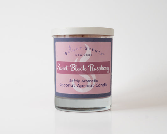 Sweet Black Raspberry Softly Aromatic Coconut Apricot Candle by Slight Scents New York against a white background.