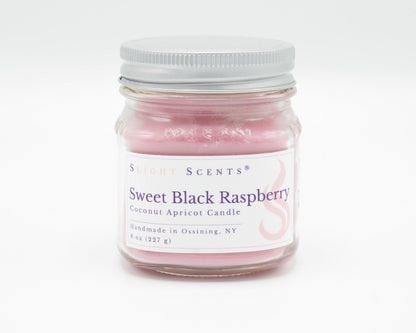 Sweet Black Raspberry Coconut Apricot Candle in a 8oz mason jar. Front view.