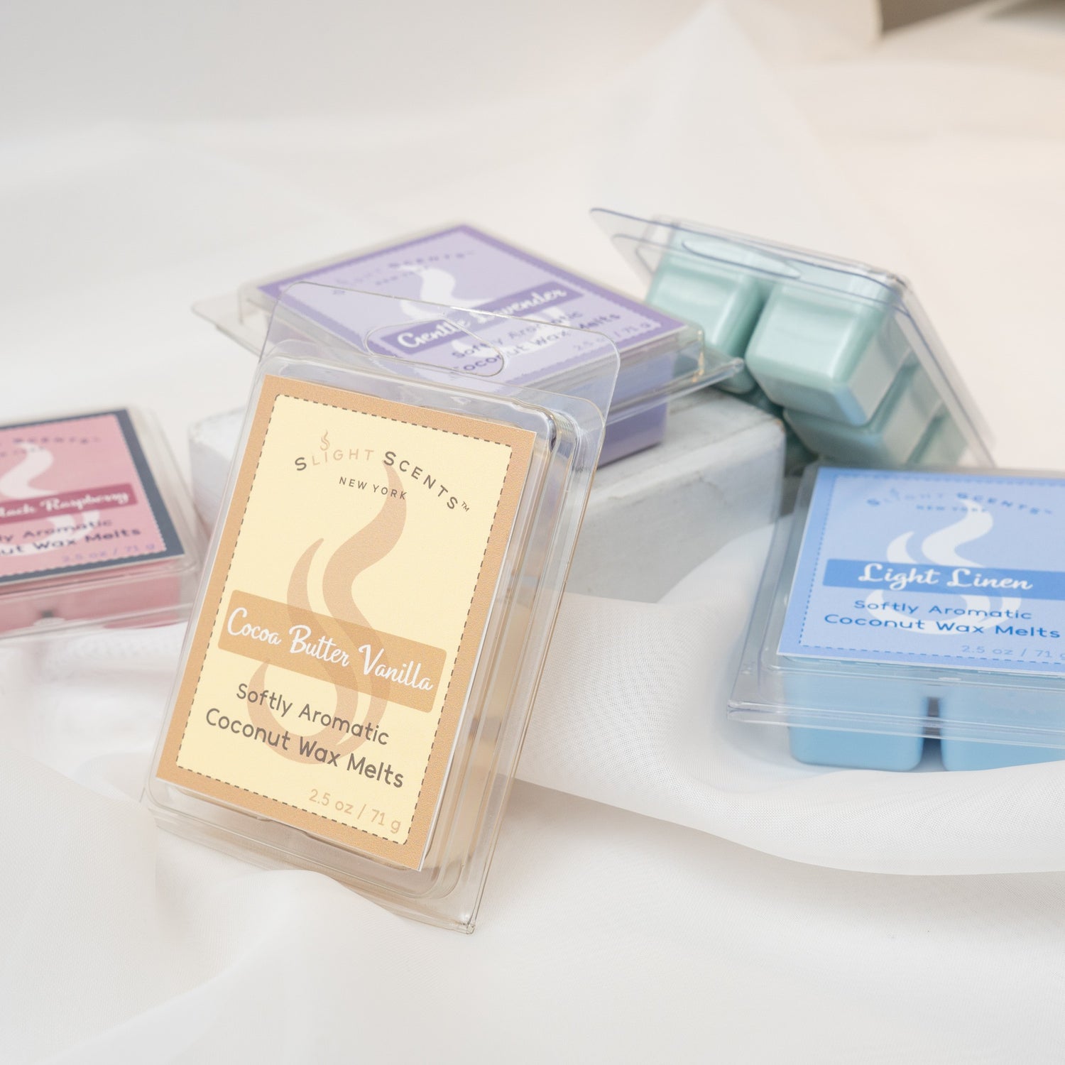 Slight Scents Assorted Wax Melts on a white sheet.